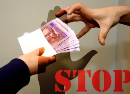 «Стоп-коррупция» в Харькове: на взятках попались милиционеры, архитектор и преподаватель