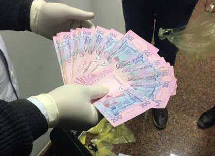 Харьковский полицейский согласился за взятку сфальсифицировать данные ДТП (ФОТО)