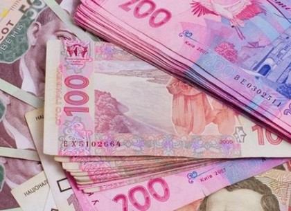 Национальный банк понизил официальный курс гривны на 21 копейку до 28,10 гривен за доллар.