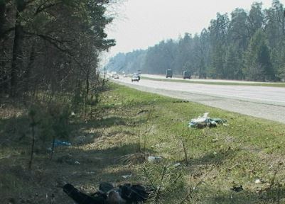 На обочине дороги под Харьковом нашли труп местной жительницы